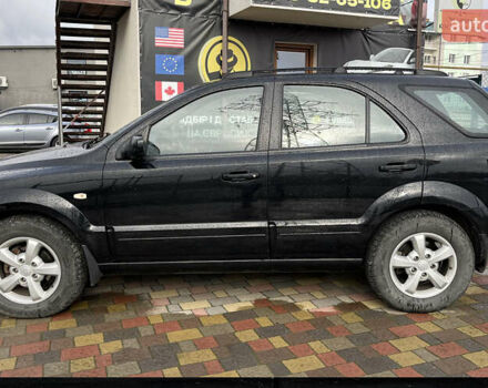 Чорний Кіа Соренто, об'ємом двигуна 2.5 л та пробігом 240 тис. км за 8999 $, фото 3 на Automoto.ua