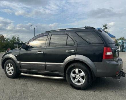 Чорний Кіа Соренто, об'ємом двигуна 2.5 л та пробігом 243 тис. км за 7500 $, фото 3 на Automoto.ua