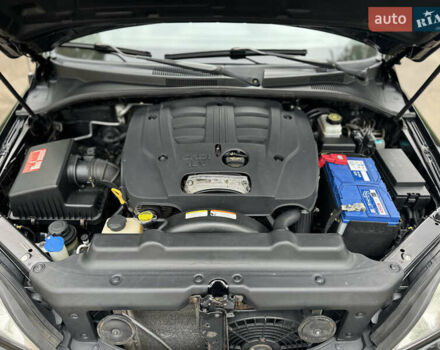 Черный Киа Соренто, объемом двигателя 2.5 л и пробегом 213 тыс. км за 7700 $, фото 13 на Automoto.ua