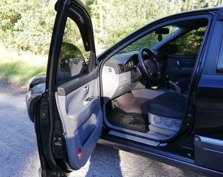 Чорний Кіа Соренто, об'ємом двигуна 2.5 л та пробігом 160 тис. км за 9500 $, фото 7 на Automoto.ua