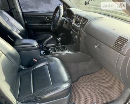 Черный Киа Соренто, объемом двигателя 2.5 л и пробегом 291 тыс. км за 9000 $, фото 16 на Automoto.ua