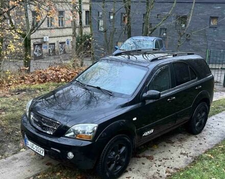 Черный Киа Соренто, объемом двигателя 2.5 л и пробегом 230 тыс. км за 4900 $, фото 2 на Automoto.ua