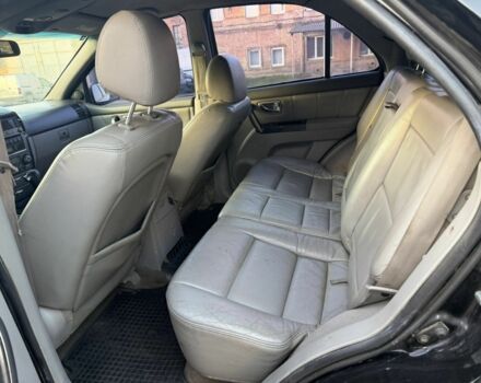 Черный Киа Соренто, объемом двигателя 2.5 л и пробегом 233 тыс. км за 4500 $, фото 7 на Automoto.ua