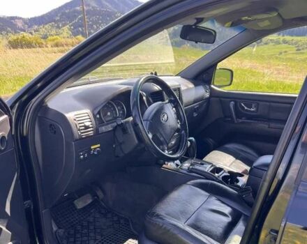 Черный Киа Соренто, объемом двигателя 2.5 л и пробегом 210 тыс. км за 5500 $, фото 23 на Automoto.ua