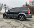 Чорний Кіа Соренто, об'ємом двигуна 2.5 л та пробігом 320 тис. км за 8299 $, фото 1 на Automoto.ua