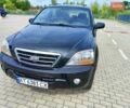 Черный Киа Соренто, объемом двигателя 2.5 л и пробегом 240 тыс. км за 9700 $, фото 1 на Automoto.ua