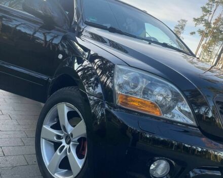 Черный Киа Соренто, объемом двигателя 2.5 л и пробегом 255 тыс. км за 8600 $, фото 1 на Automoto.ua