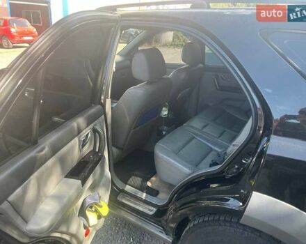 Черный Киа Соренто, объемом двигателя 2.5 л и пробегом 215 тыс. км за 8500 $, фото 3 на Automoto.ua