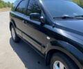 Чорний Кіа Соренто, об'ємом двигуна 2.5 л та пробігом 243 тис. км за 9000 $, фото 1 на Automoto.ua