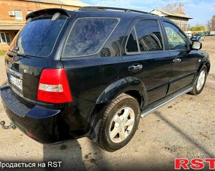 Черный Киа Соренто, объемом двигателя 2.5 л и пробегом 258 тыс. км за 4500 $, фото 5 на Automoto.ua