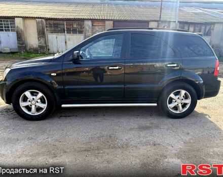 Черный Киа Соренто, объемом двигателя 2.5 л и пробегом 258 тыс. км за 4500 $, фото 1 на Automoto.ua
