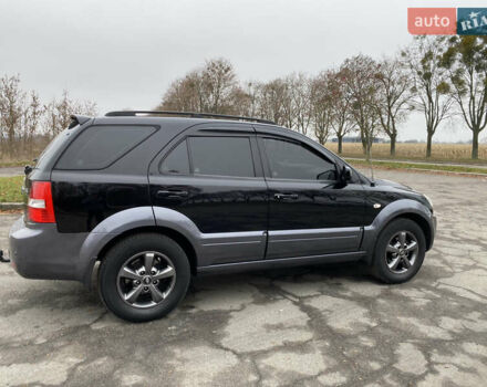 Чорний Кіа Соренто, об'ємом двигуна 2.5 л та пробігом 320 тис. км за 8299 $, фото 4 на Automoto.ua