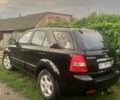 Черный Киа Соренто, объемом двигателя 2.5 л и пробегом 280 тыс. км за 4500 $, фото 1 на Automoto.ua