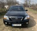 Черный Киа Соренто, объемом двигателя 2.5 л и пробегом 277 тыс. км за 8500 $, фото 1 на Automoto.ua