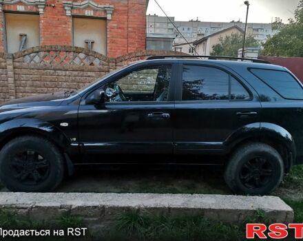 Чорний Кіа Соренто, об'ємом двигуна 3.5 л та пробігом 295 тис. км за 5250 $, фото 3 на Automoto.ua
