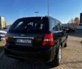 Черный Киа Соренто, объемом двигателя 2.5 л и пробегом 240 тыс. км за 3200 $, фото 4 на Automoto.ua