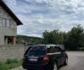 Черный Киа Соренто, объемом двигателя 2.5 л и пробегом 165 тыс. км за 7200 $, фото 1 на Automoto.ua