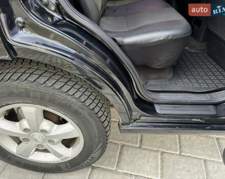 Черный Киа Соренто, объемом двигателя 2.5 л и пробегом 237 тыс. км за 5500 $, фото 9 на Automoto.ua