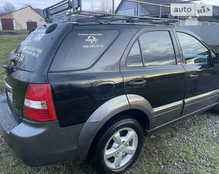 Черный Киа Соренто, объемом двигателя 2.5 л и пробегом 300 тыс. км за 8700 $, фото 6 на Automoto.ua