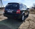 Черный Киа Соренто, объемом двигателя 2.5 л и пробегом 380 тыс. км за 8200 $, фото 7 на Automoto.ua