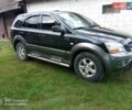 Черный Киа Соренто, объемом двигателя 2.5 л и пробегом 310 тыс. км за 8600 $, фото 1 на Automoto.ua