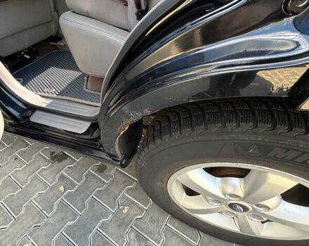 Черный Киа Соренто, объемом двигателя 2.5 л и пробегом 230 тыс. км за 8100 $, фото 17 на Automoto.ua