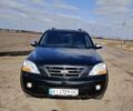 Черный Киа Соренто, объемом двигателя 2.5 л и пробегом 380 тыс. км за 8200 $, фото 1 на Automoto.ua
