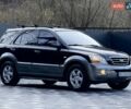 Черный Киа Соренто, объемом двигателя 2.5 л и пробегом 208 тыс. км за 8200 $, фото 18 на Automoto.ua