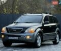 Черный Киа Соренто, объемом двигателя 2.5 л и пробегом 208 тыс. км за 8200 $, фото 78 на Automoto.ua