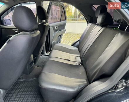 Черный Киа Соренто, объемом двигателя 2.5 л и пробегом 237 тыс. км за 5500 $, фото 14 на Automoto.ua