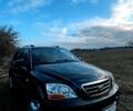 Черный Киа Соренто, объемом двигателя 2.5 л и пробегом 226 тыс. км за 9500 $, фото 1 на Automoto.ua