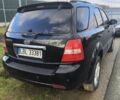 Черный Киа Соренто, объемом двигателя 2.5 л и пробегом 250 тыс. км за 4870 $, фото 4 на Automoto.ua