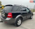 Черный Киа Соренто, объемом двигателя 2.5 л и пробегом 203 тыс. км за 8700 $, фото 3 на Automoto.ua