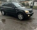 Чорний Кіа Соренто, об'ємом двигуна 2.5 л та пробігом 242 тис. км за 7400 $, фото 39 на Automoto.ua