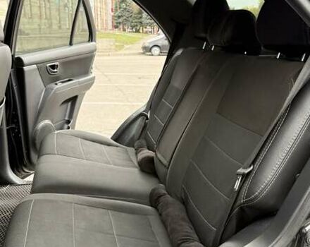 Чорний Кіа Соренто, об'ємом двигуна 2.5 л та пробігом 220 тис. км за 7000 $, фото 15 на Automoto.ua