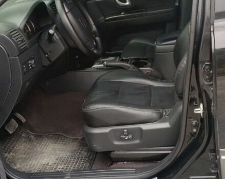 Черный Киа Соренто, объемом двигателя 2.5 л и пробегом 300 тыс. км за 8000 $, фото 4 на Automoto.ua