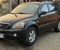 Черный Киа Соренто, объемом двигателя 2.5 л и пробегом 290 тыс. км за 5200 $, фото 4 на Automoto.ua