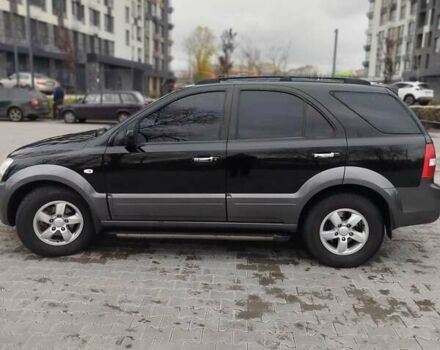 Черный Киа Соренто, объемом двигателя 2.5 л и пробегом 213 тыс. км за 8500 $, фото 2 на Automoto.ua