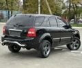 Черный Киа Соренто, объемом двигателя 2.5 л и пробегом 300 тыс. км за 5399 $, фото 15 на Automoto.ua