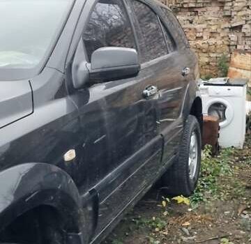 Черный Киа Соренто, объемом двигателя 2.5 л и пробегом 300 тыс. км за 4600 $, фото 2 на Automoto.ua