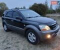 Черный Киа Соренто, объемом двигателя 2.5 л и пробегом 200 тыс. км за 7800 $, фото 1 на Automoto.ua