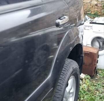 Черный Киа Соренто, объемом двигателя 2.5 л и пробегом 300 тыс. км за 4600 $, фото 1 на Automoto.ua