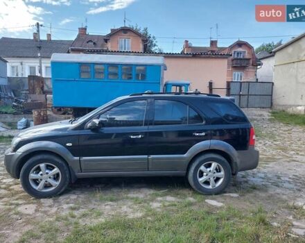 Черный Киа Соренто, объемом двигателя 2.5 л и пробегом 197 тыс. км за 10000 $, фото 13 на Automoto.ua