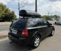 Черный Киа Соренто, объемом двигателя 2.5 л и пробегом 280 тыс. км за 6500 $, фото 4 на Automoto.ua
