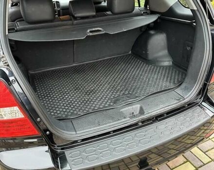 Черный Киа Соренто, объемом двигателя 2.5 л и пробегом 199 тыс. км за 10350 $, фото 10 на Automoto.ua