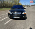 Черный Киа Соренто, объемом двигателя 2.5 л и пробегом 223 тыс. км за 9500 $, фото 1 на Automoto.ua