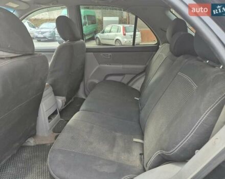 Черный Киа Соренто, объемом двигателя 2.5 л и пробегом 350 тыс. км за 3700 $, фото 13 на Automoto.ua