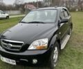 Черный Киа Соренто, объемом двигателя 2.5 л и пробегом 199 тыс. км за 10350 $, фото 1 на Automoto.ua