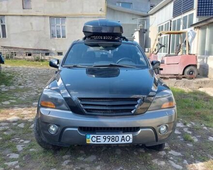 Черный Киа Соренто, объемом двигателя 2.5 л и пробегом 197 тыс. км за 10000 $, фото 1 на Automoto.ua