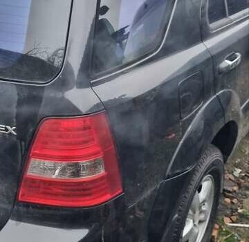 Черный Киа Соренто, объемом двигателя 2.5 л и пробегом 300 тыс. км за 4600 $, фото 10 на Automoto.ua